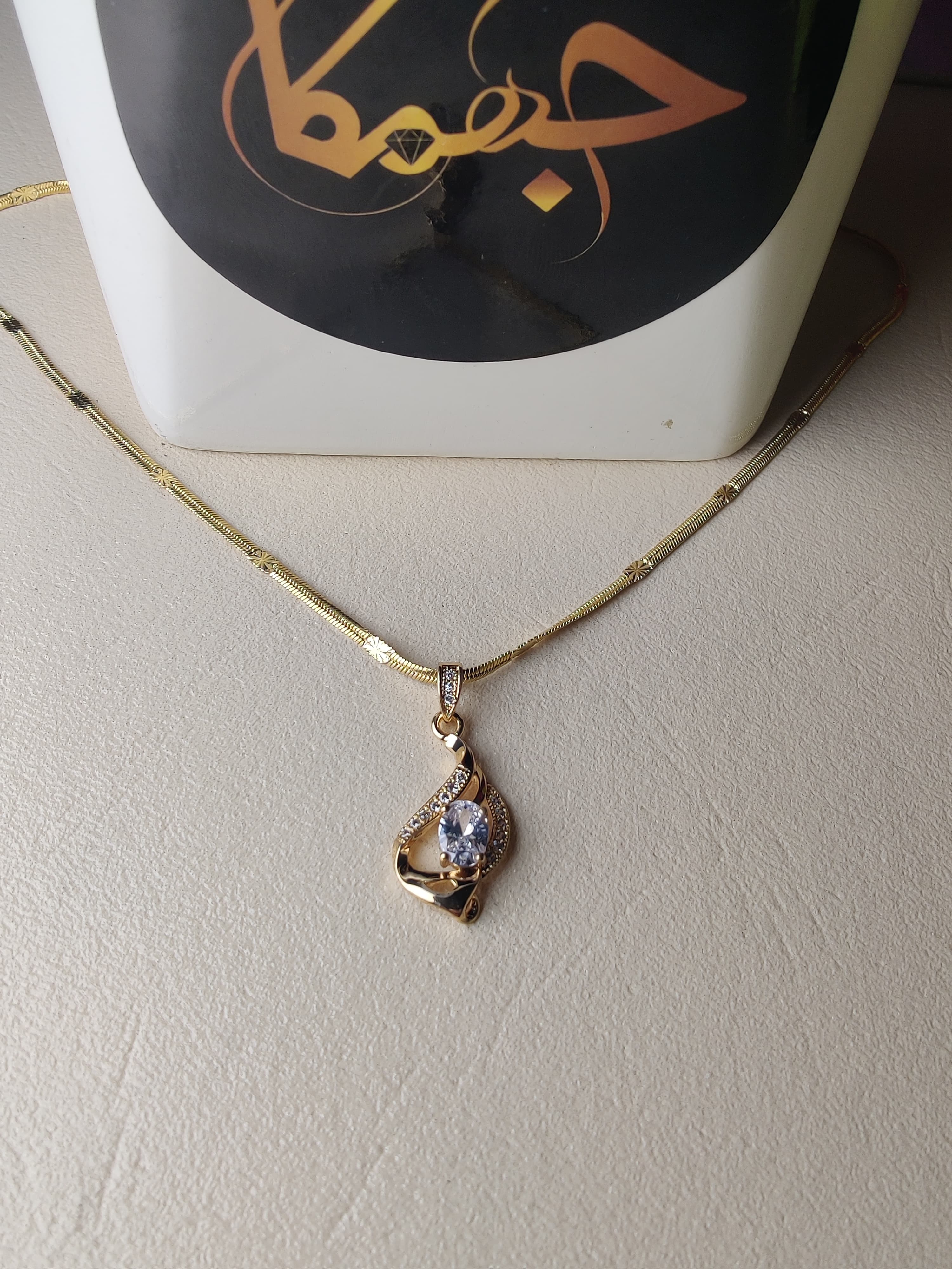precious gold aura pendent