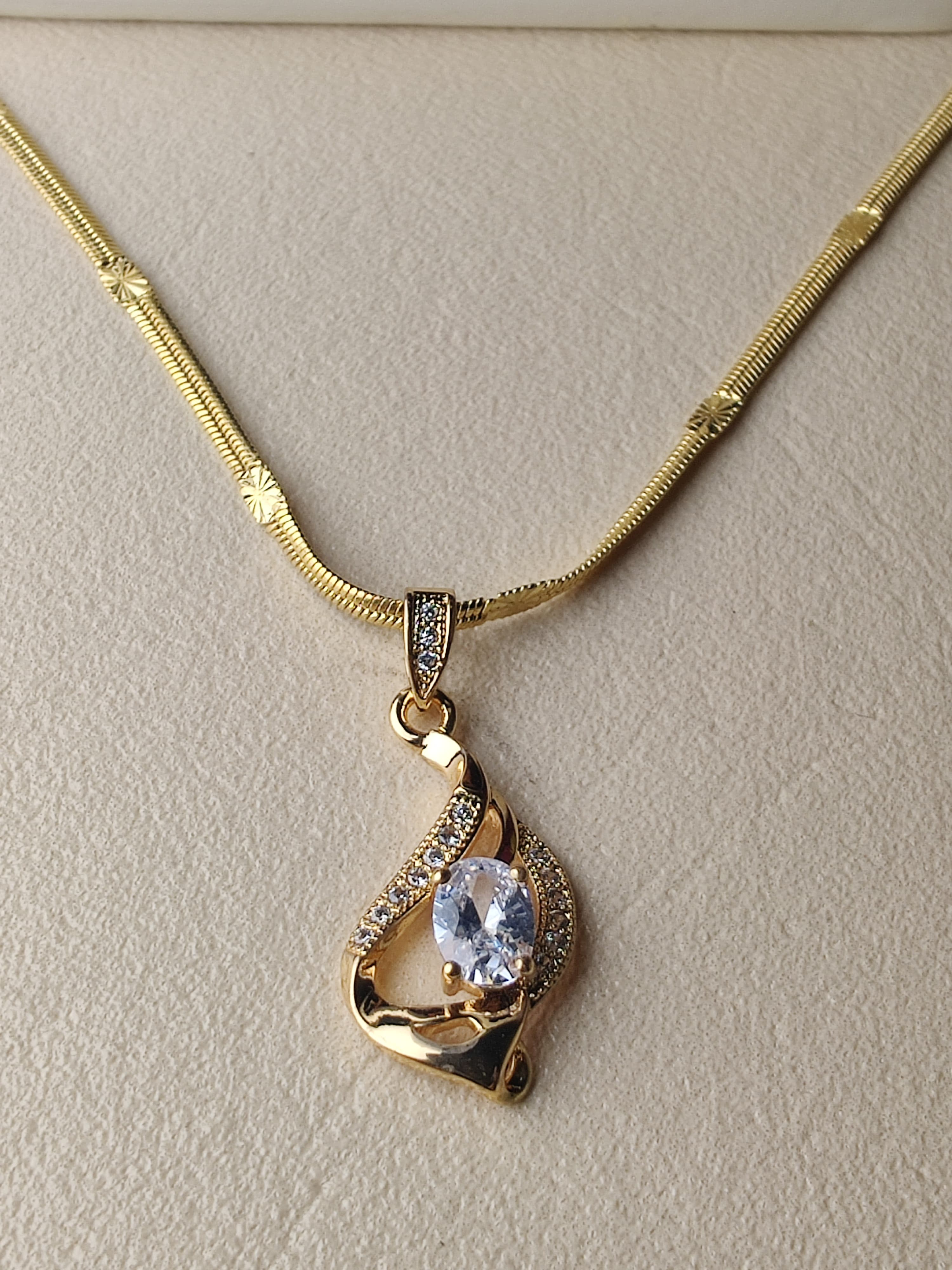 precious gold aura pendent