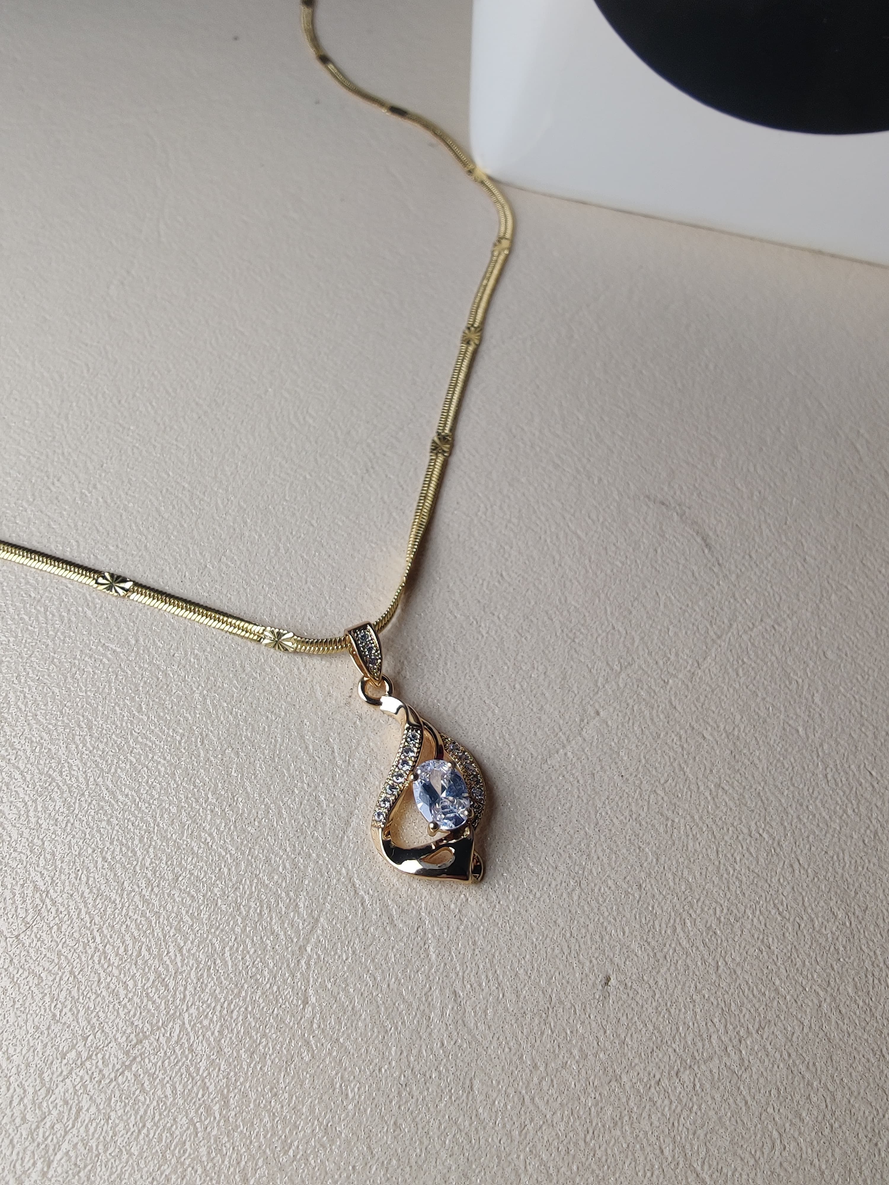 precious gold aura pendent